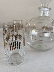 Karafje met 6 glaasjes glas helder/goud