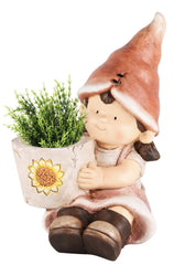 Meisje zittend met bloempot