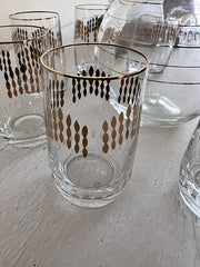 Karafje met 6 glaasjes glas helder/goud