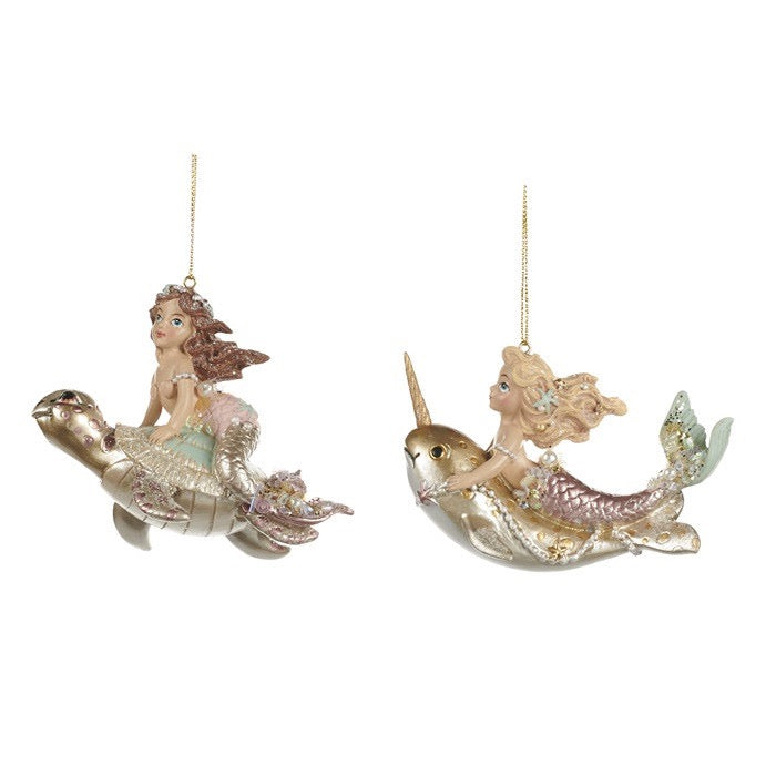 Mermaids riding Sea Animal